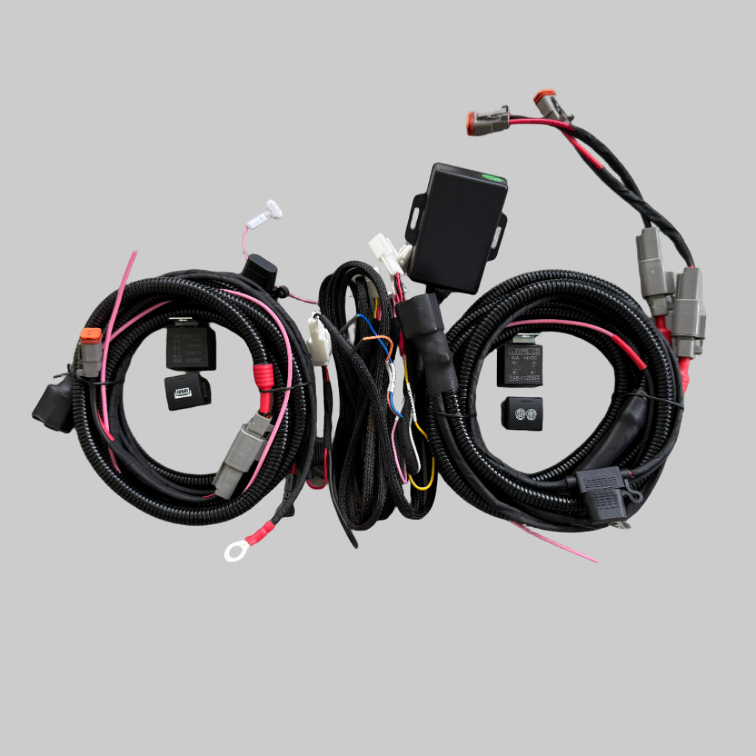 Set of vehicle wiring harnesses on a flat surface