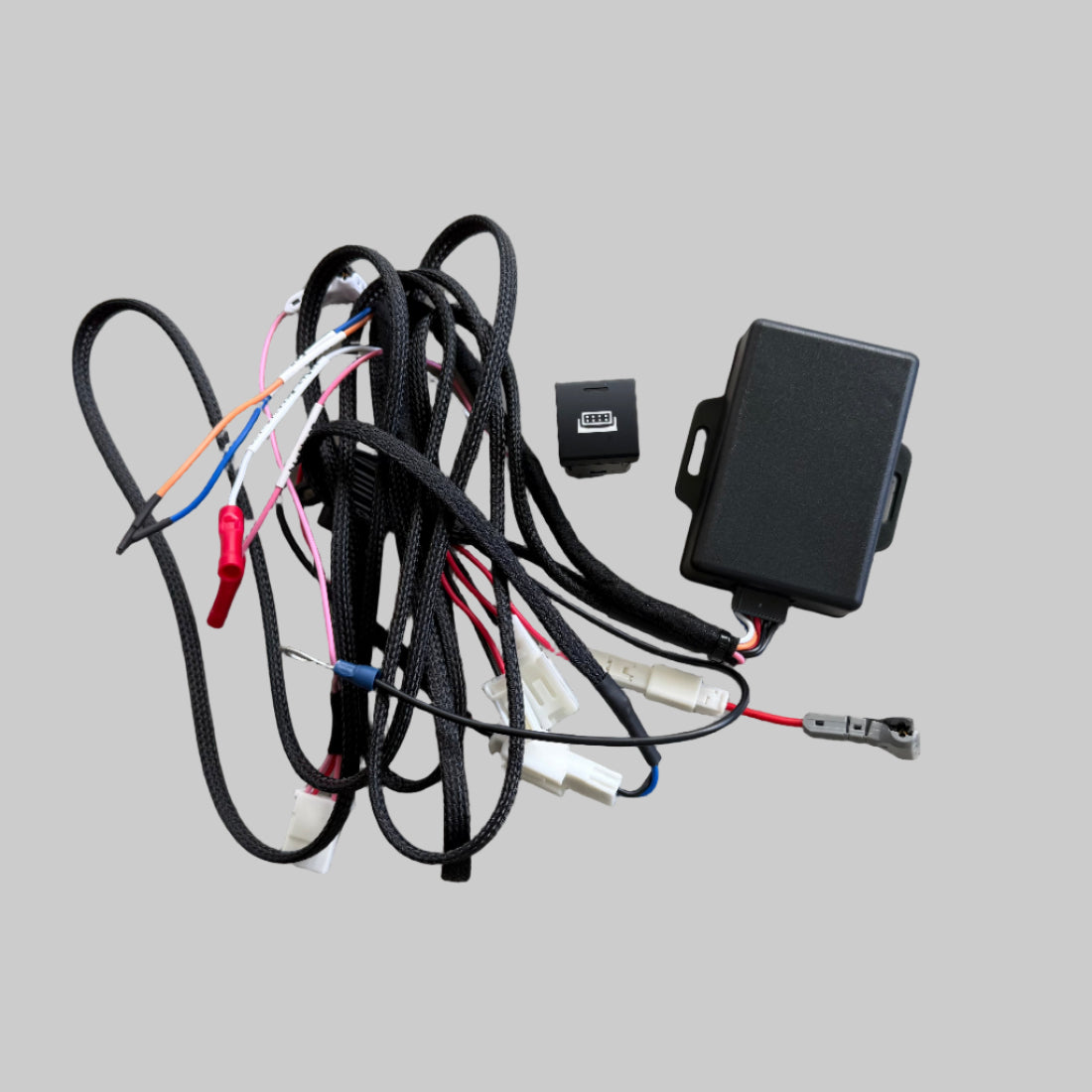 Car wiring harness and connectors on a gray surface